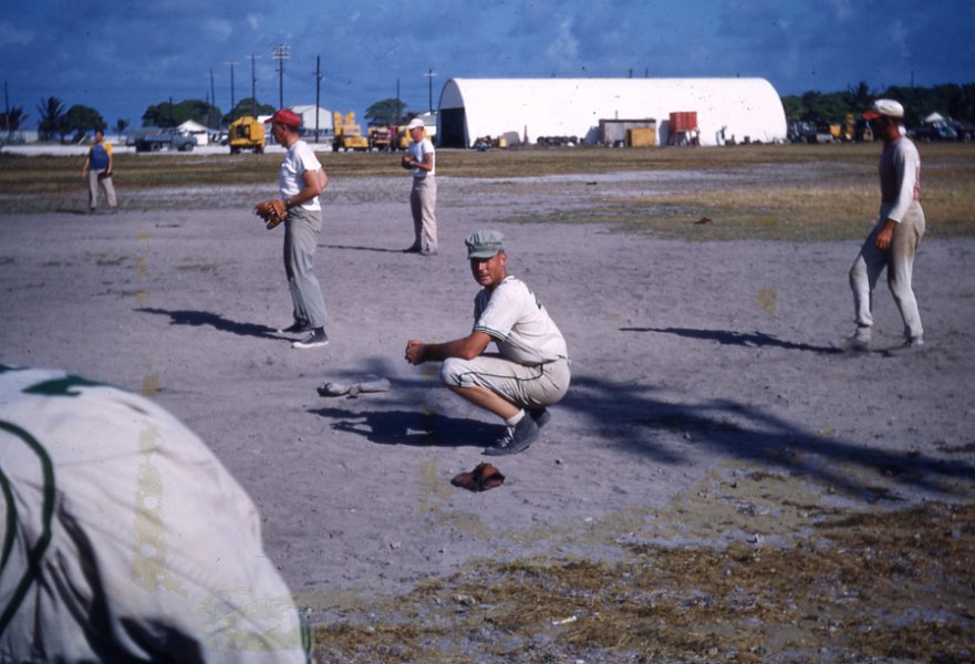 Kwaj-Dad-playing-baseball